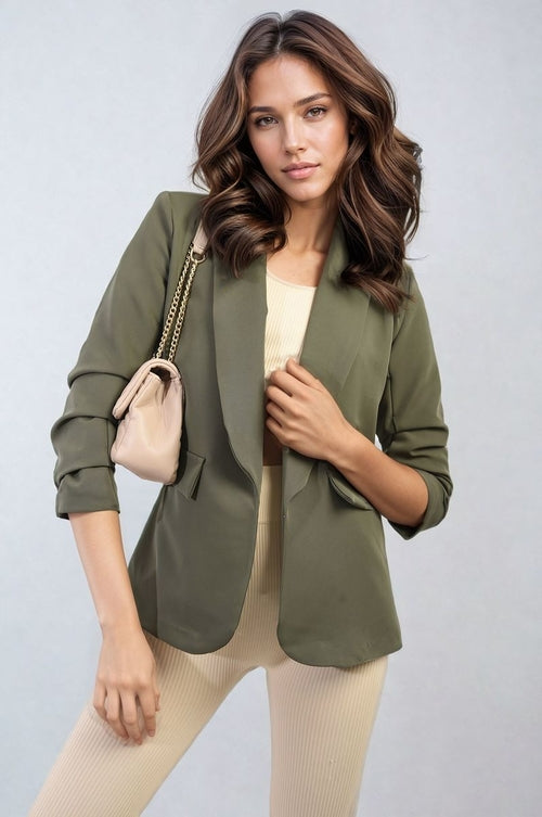 Open-front ruched-sleeve blazer jacket in olive green with front pockets and gathered cuffs.