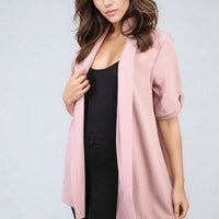 Soft pink open-front cardigan with short sleeves and layered drape front