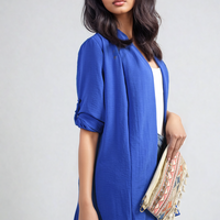 Blue open-front cardigan with rolled sleeves and side button cuff detail