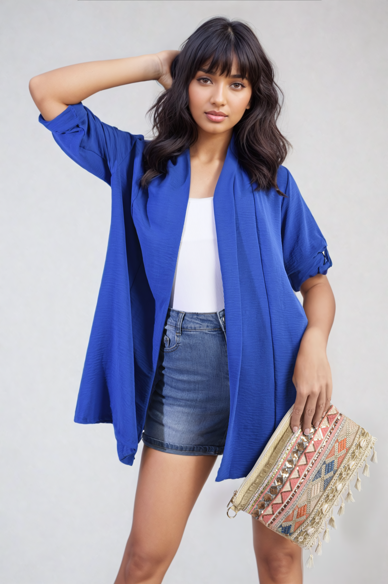 Royal blue open-front cardigan with rolled sleeves and soft draped front