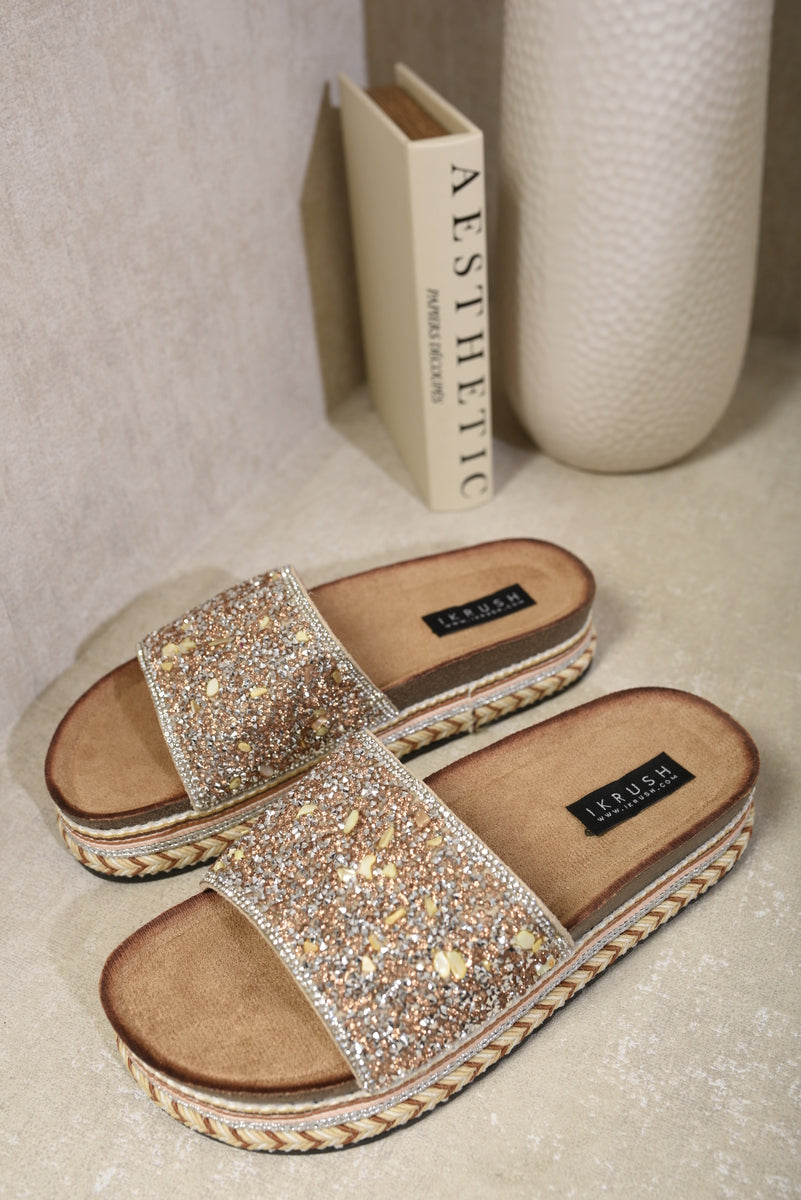 Gold glitter platform slide sandals with open toe, wide strap, and braided sole