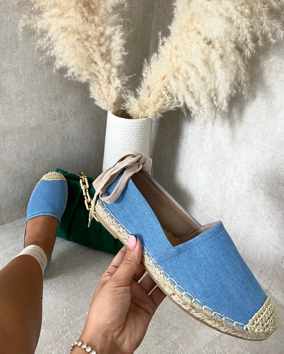 Light blue slip-on espadrille with woven toe cap and adjustable ankle tie
