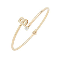 Gold B initial bangle bracelet with pavé details and small stone accent