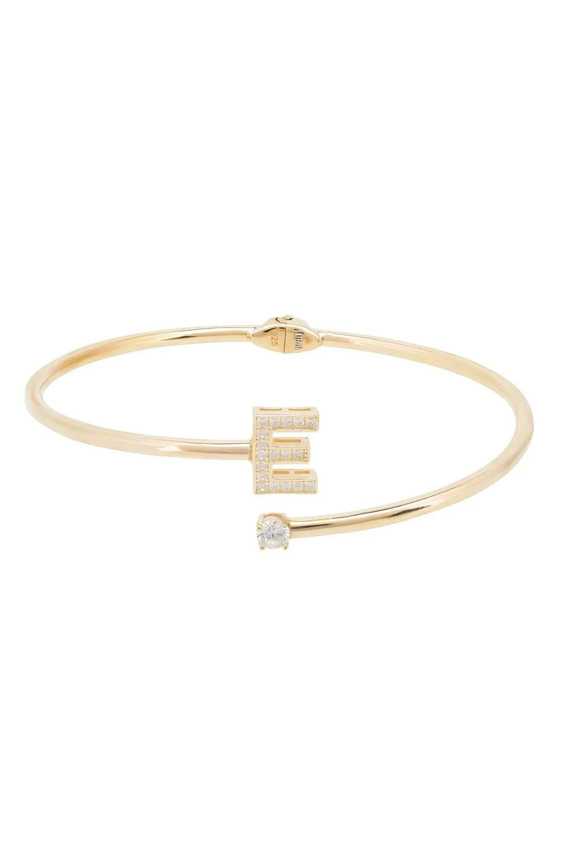 Gold-tone initial E bangle bracelet with central E charm and clear stones
