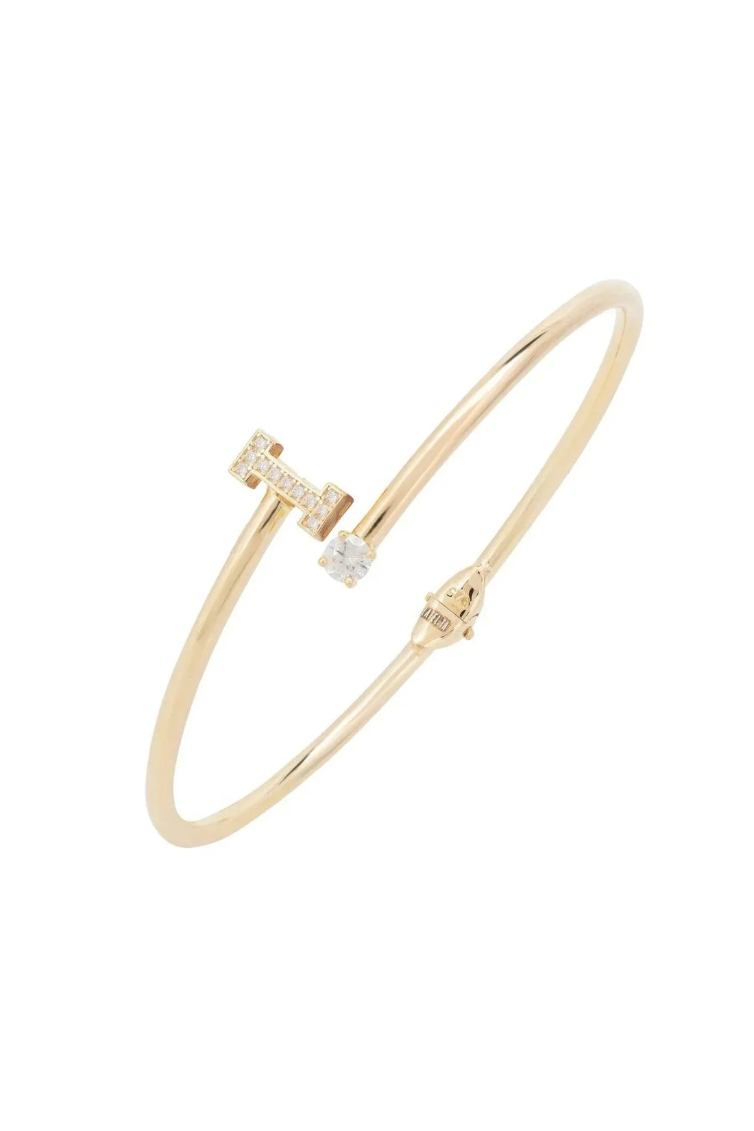 Gold tone initial bangle with clear stone letter I centerpiece