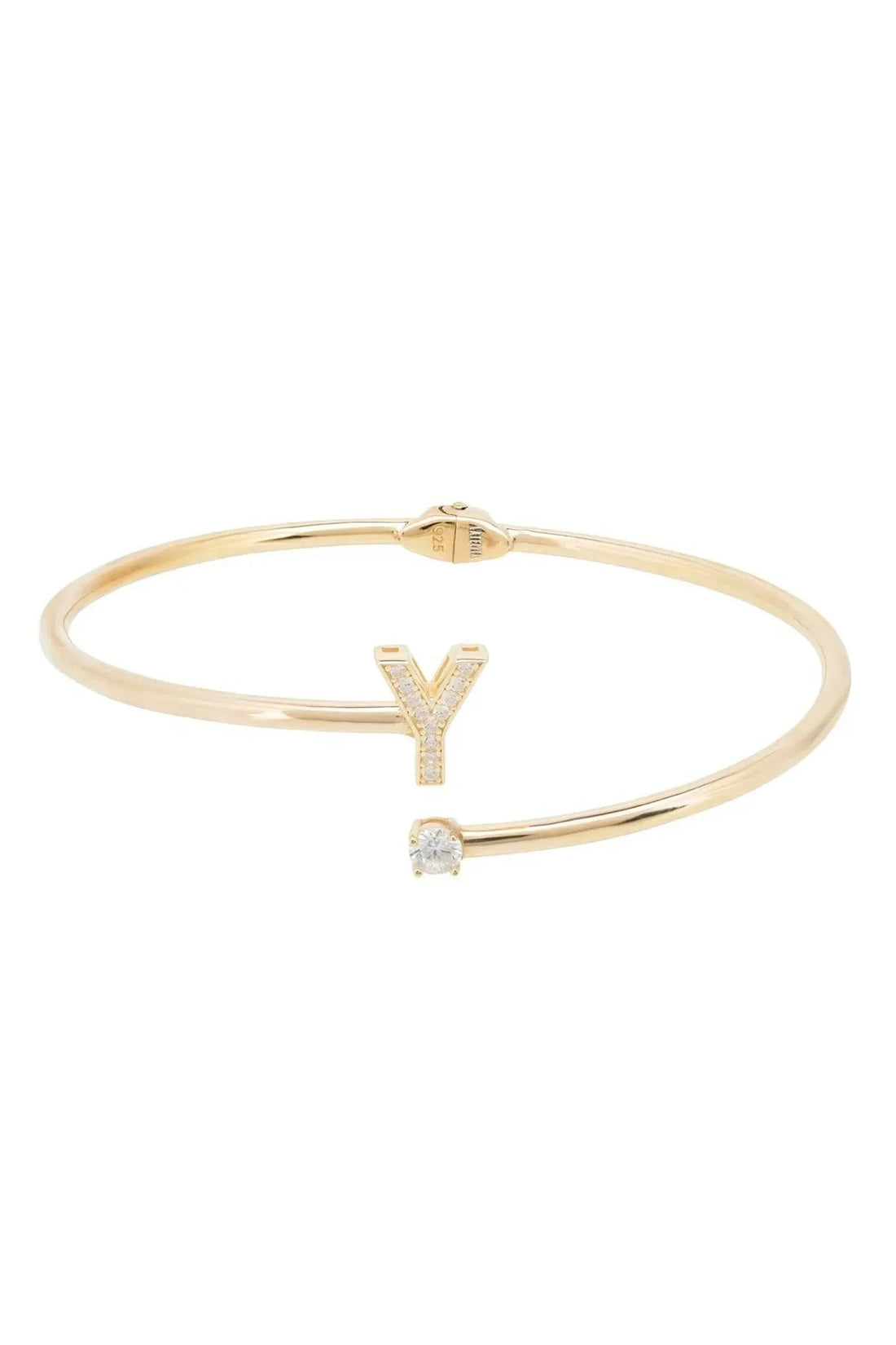 Gold-tone bangle bracelet featuring initial Y with crystal detail