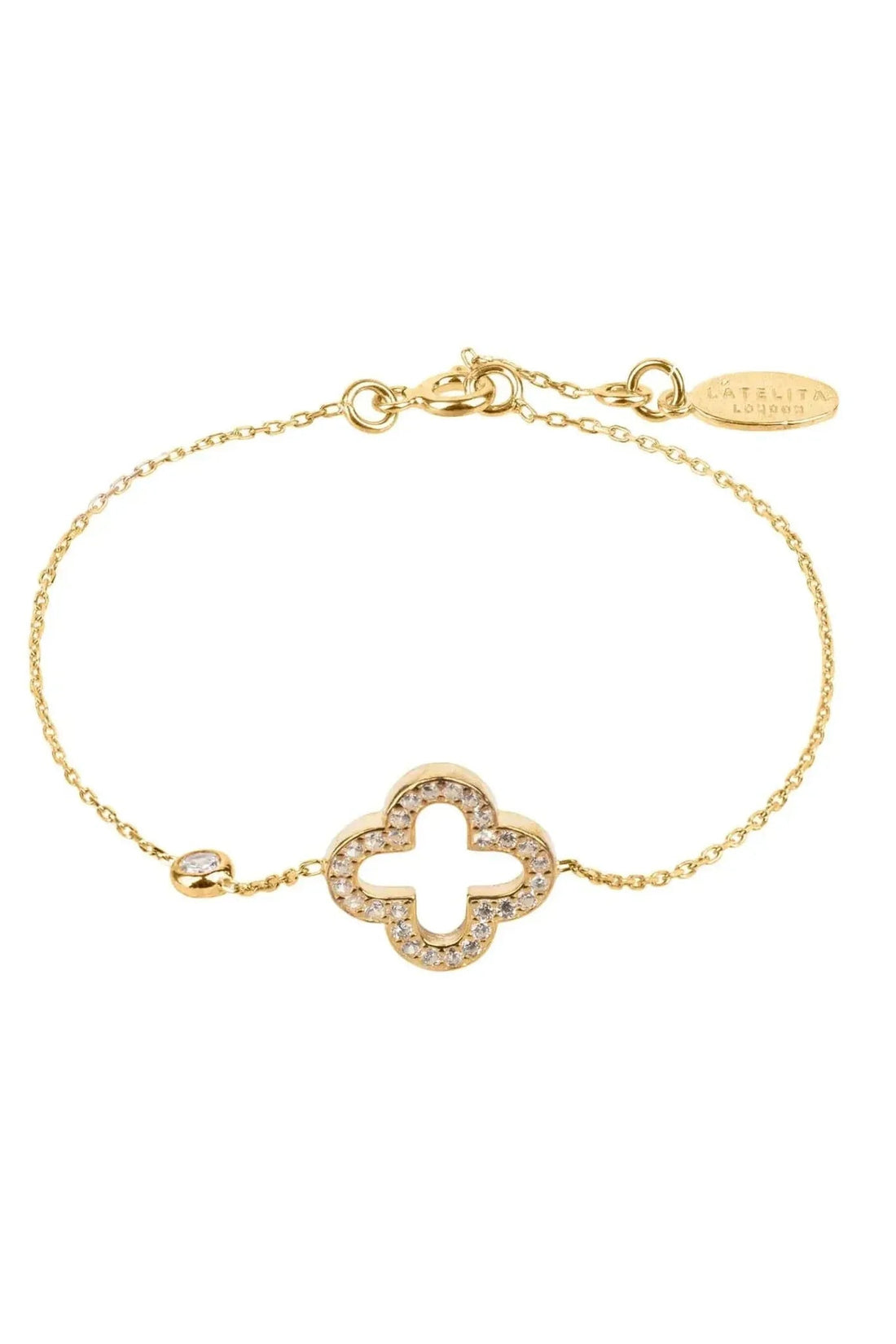 Gold clover bracelet with open four-leaf motif and pavé-style stones