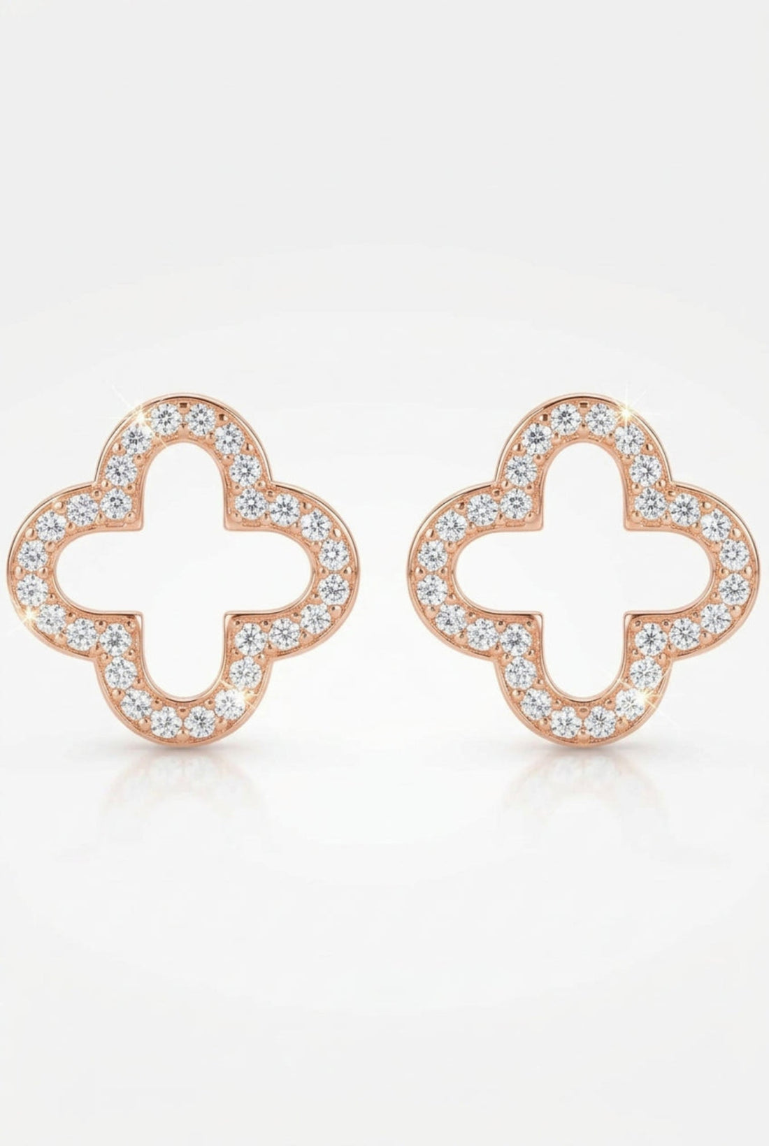 Open clover earrings in gold with clear pave stones, pair