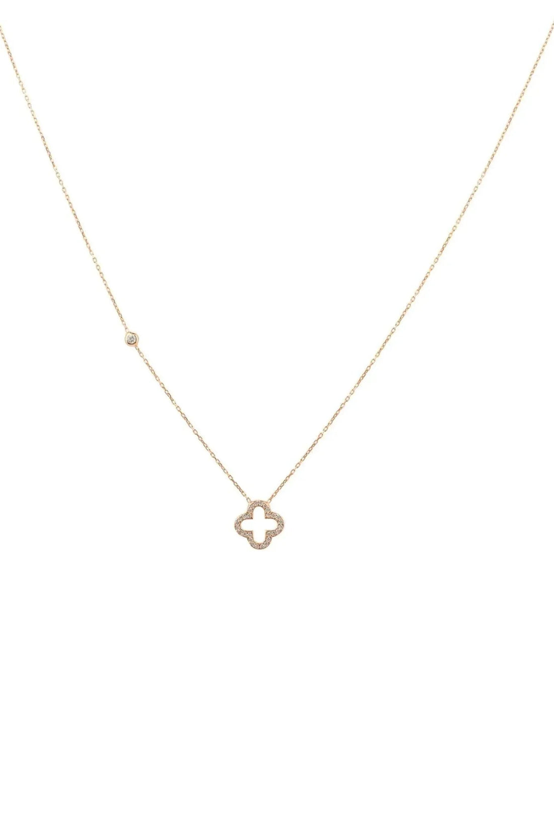 Delicate gold-tone open clover pendant necklace with minimal clover charm