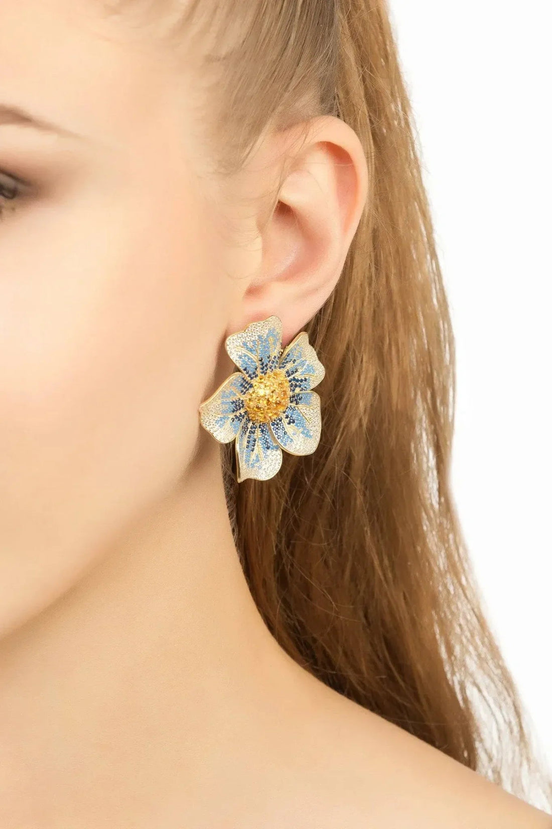 Blue and gold flower drop earrings on gold-tone hooks
