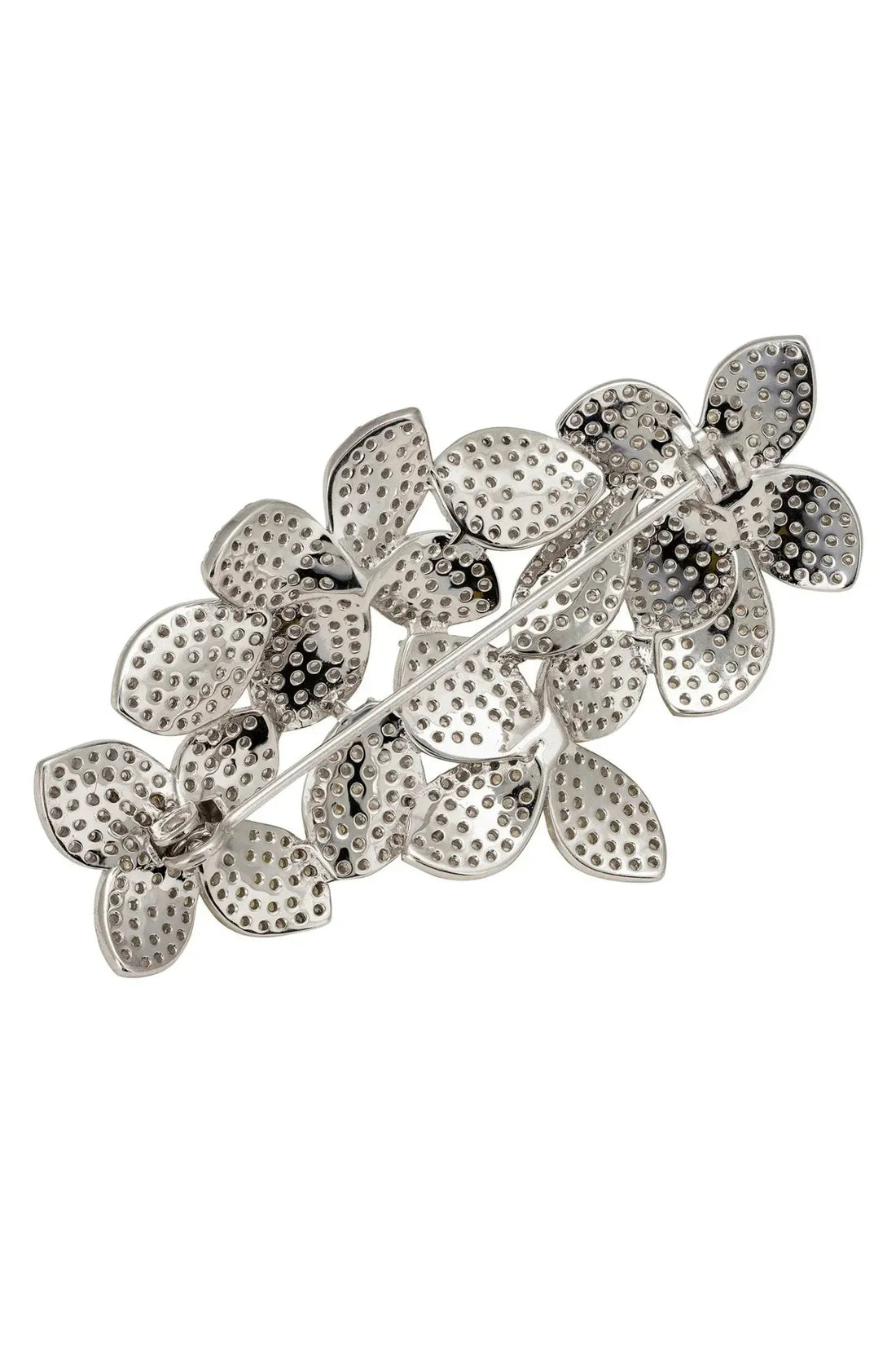 Silver flower petal brooch with rhinestone-style details and pin clasp