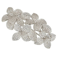 Silver cascading flower brooch with glittering petal stones