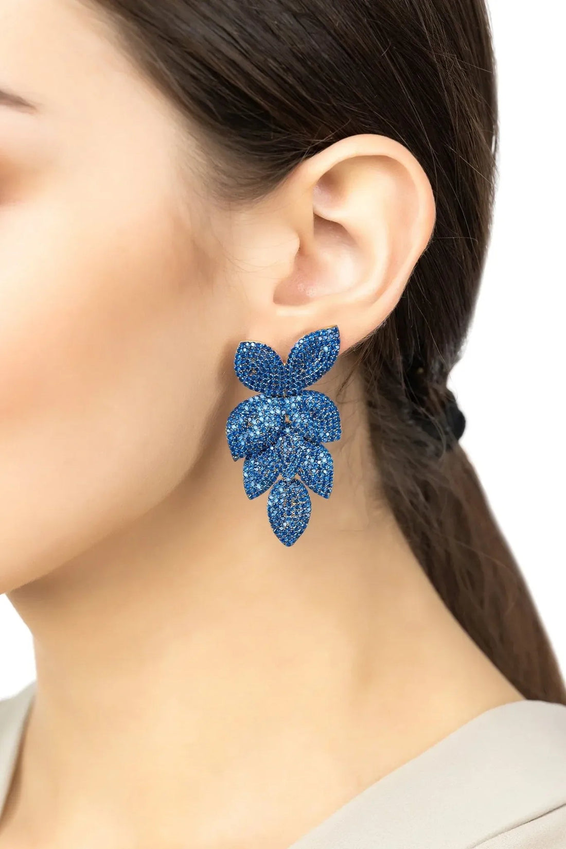 Blue rhinestone flower drop earrings on model&