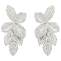 Silver cascading flower drop earrings with glittery petal design
