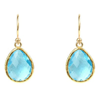 Gold-tone drop earrings with blue topaz teardrop stone