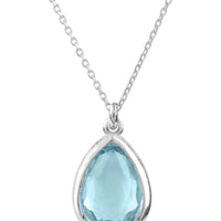 Silver teardrop pendant necklace with light blue topaz on a chain
