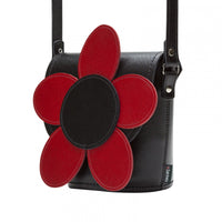 Black leather barrel bag with red daisy applique and adjustable shoulder straps