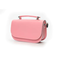 Pastel pink leather crossbody bag with curved flap and metal clasp