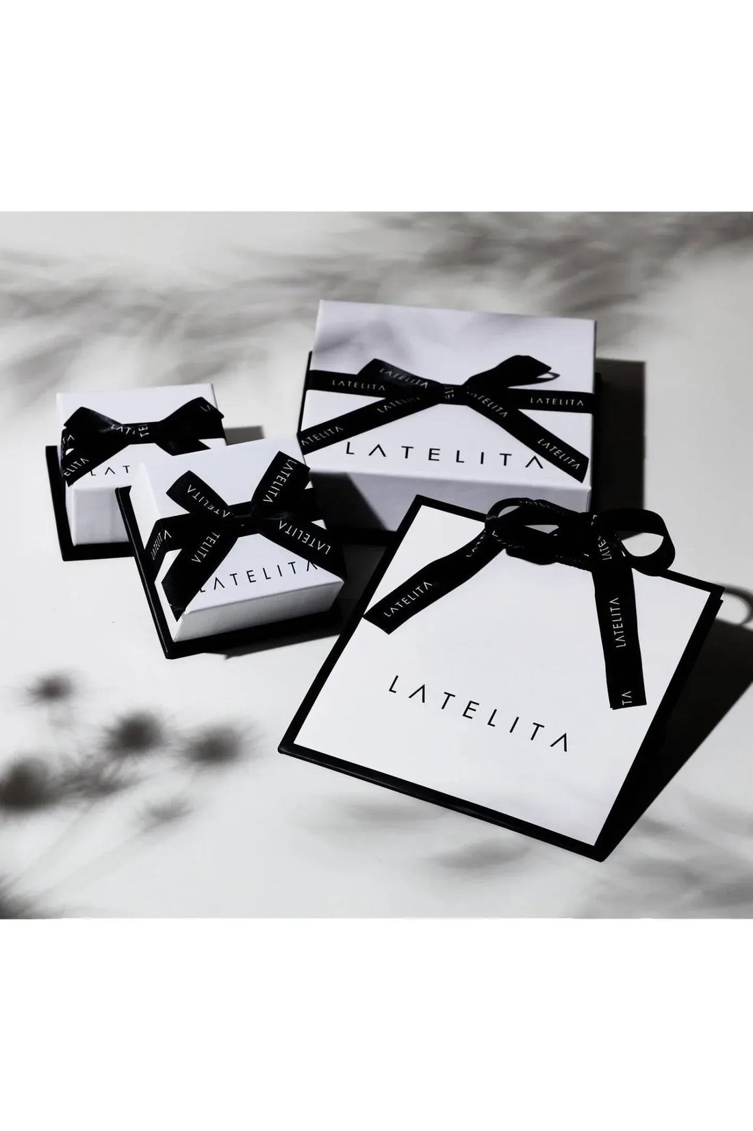 Jewelry gift boxes with black ribbon bows