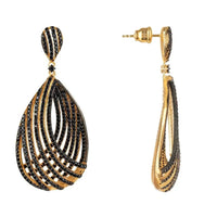 Black CZ teardrop earrings, one shown from back with gold-tone post