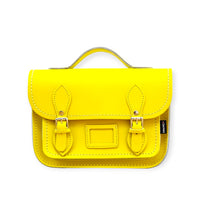 Pastel yellow leather midi satchel with front flap and two front buckles