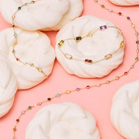 Gold rainbow gemstone bracelets with beaded chain and colorful stones