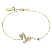 Gold Capricorn zodiac charm bracelet with glitter symbol and round clasp