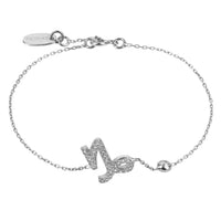 Silver Capricorn zodiac charm bracelet with glitter symbol and round clasp