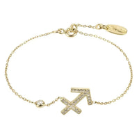 Gold Sagittarius zodiac bracelet with arrow charm and circular bead accents