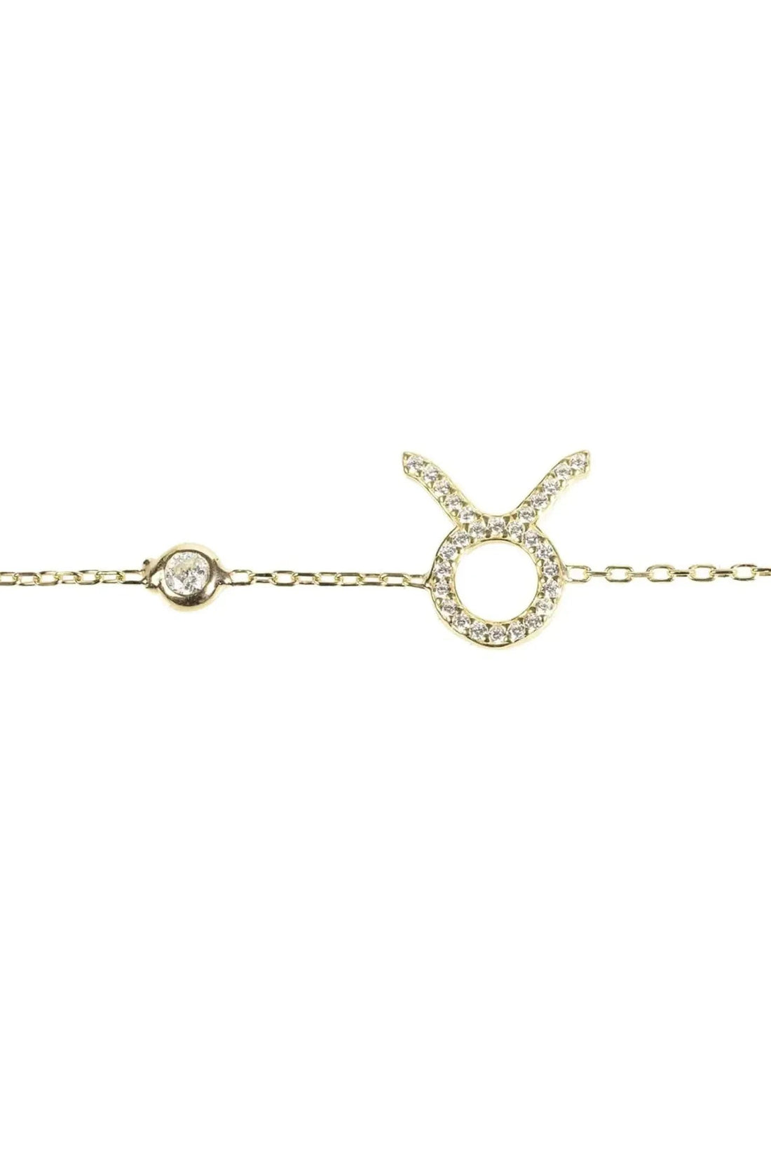 Silver-tone Taurus charm bracelet close-up with clasp ring and star sign pendant