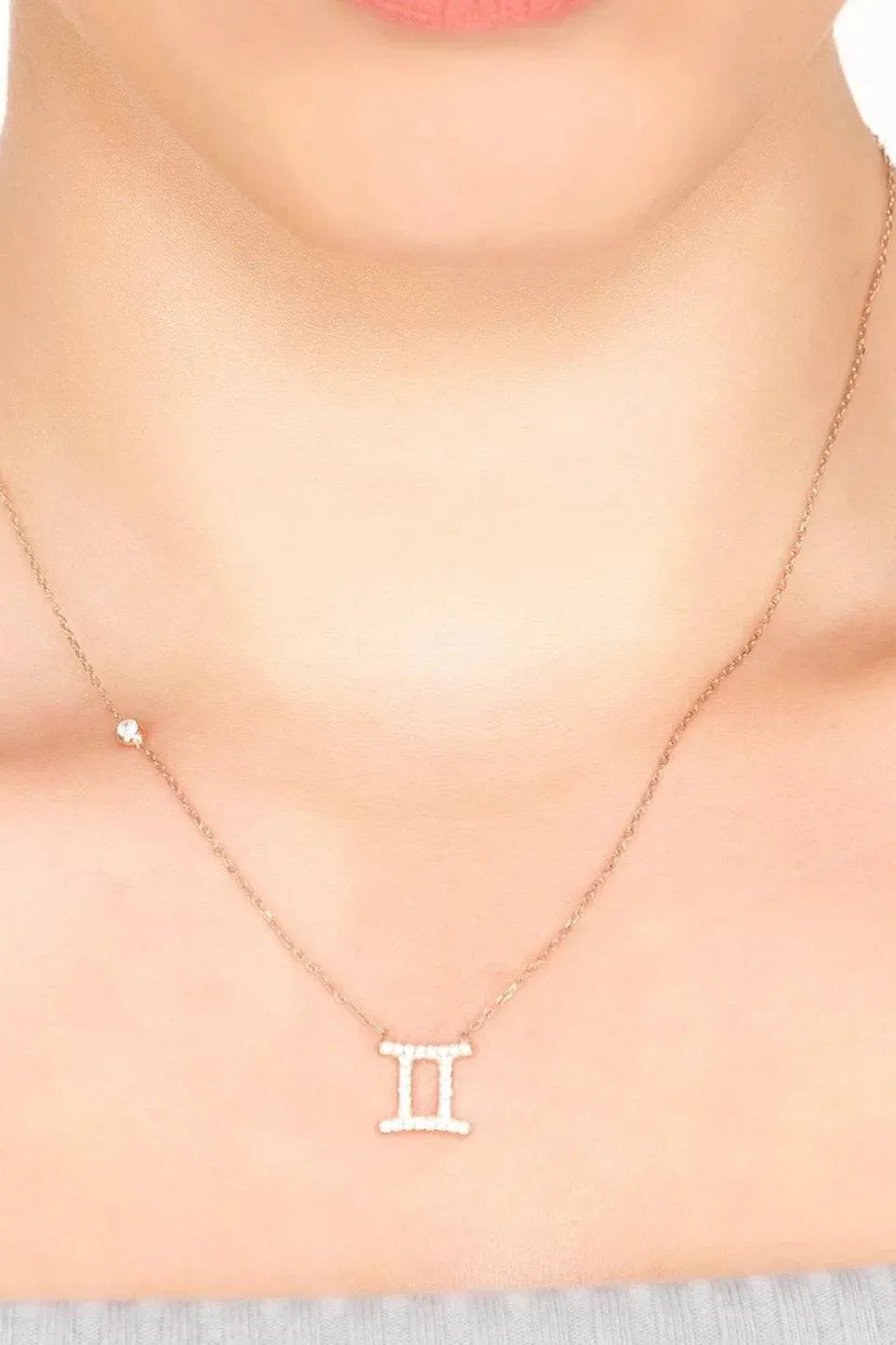 Gemini zodiac necklace with Roman numeral II pendant on thin chain