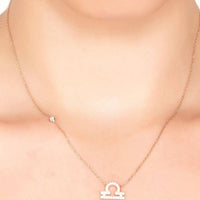 Silver chain necklace with small star charm and Libra pendant with pave border
