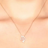 Rose-gold zodiac pendant necklace with crystal Virgo sign on a chain